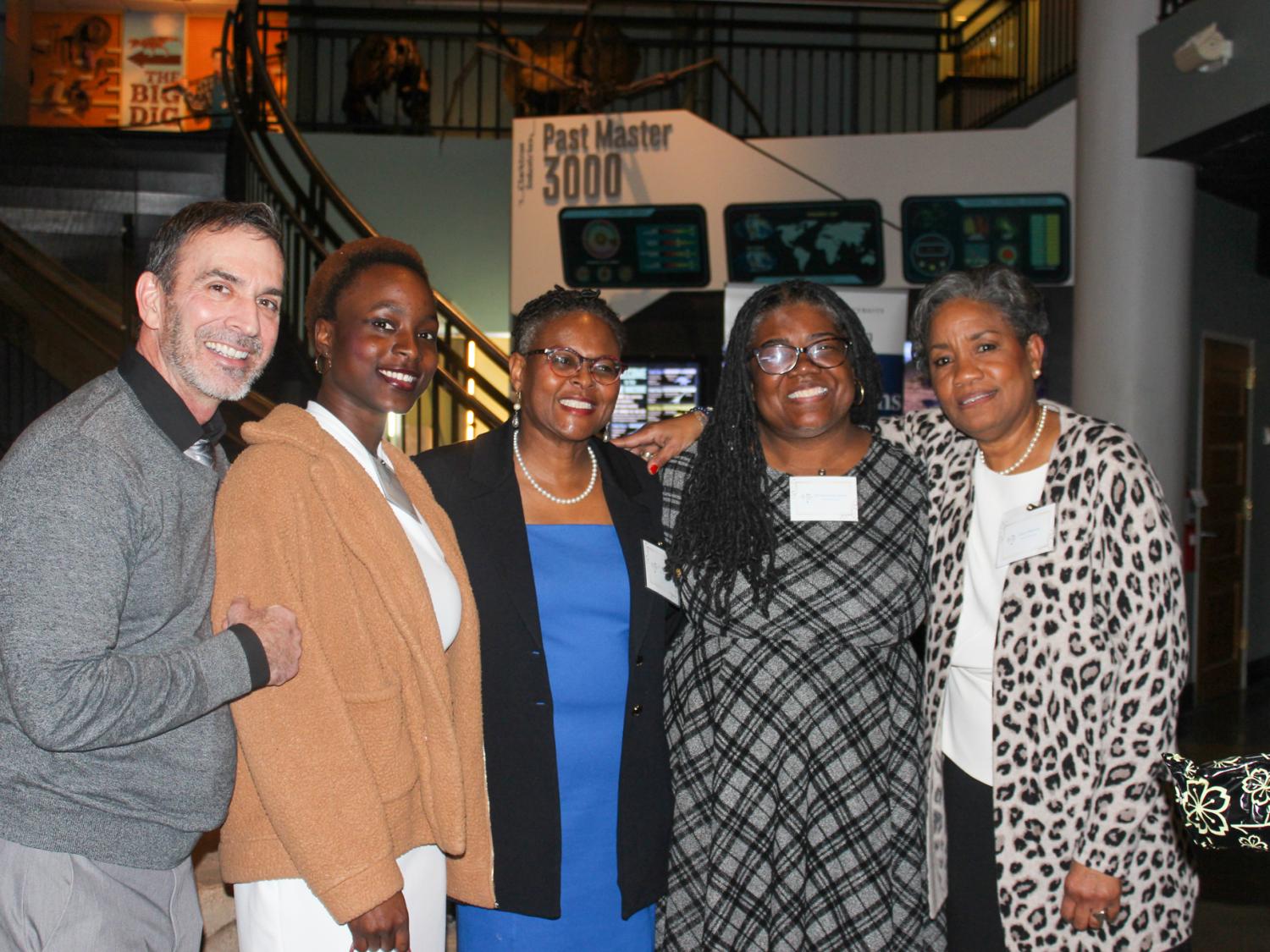 L-R: Sope Lartey, Drexel University undergraduate student, author of "An Ode to Dr. Richardson"; Dr. Tina Q. Richardson, PSU-LV Chancellor; Kristine Lewis Grant, CCUE Co-Chair; Sherri Manson, CCUE Co-Chair. 