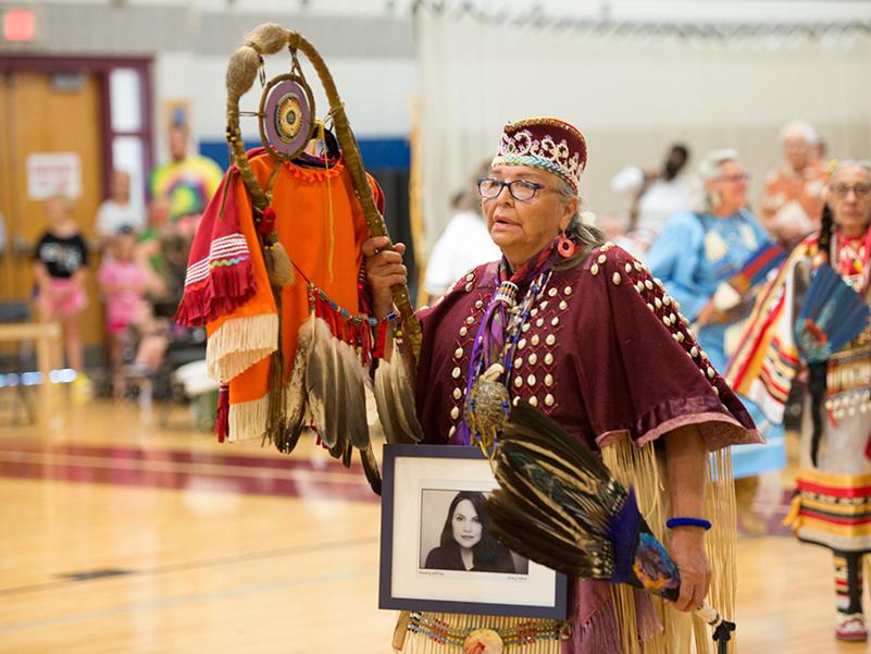 An elder Native American dance moves onto the dance floor