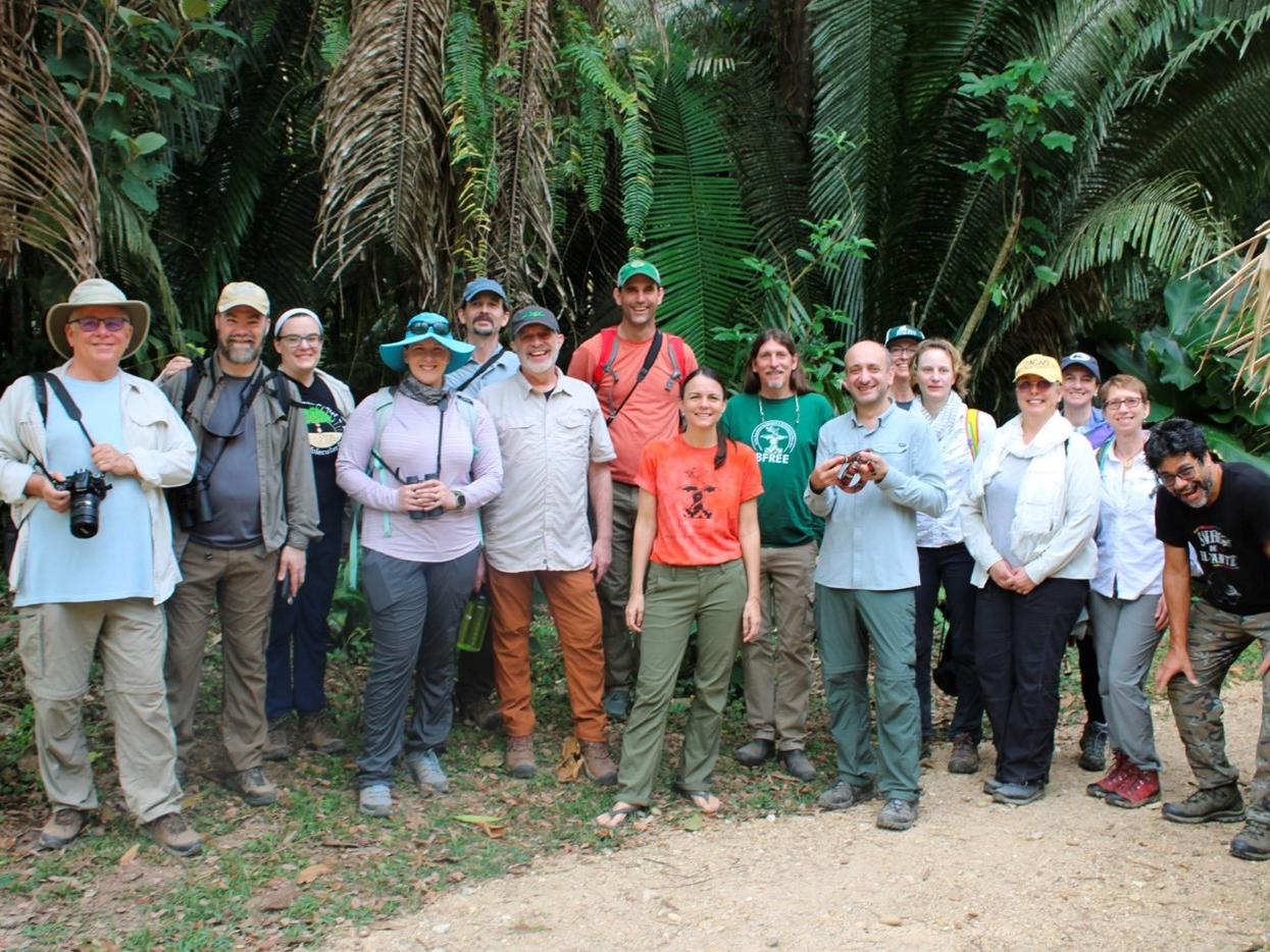 A group of people in a Belize jungle