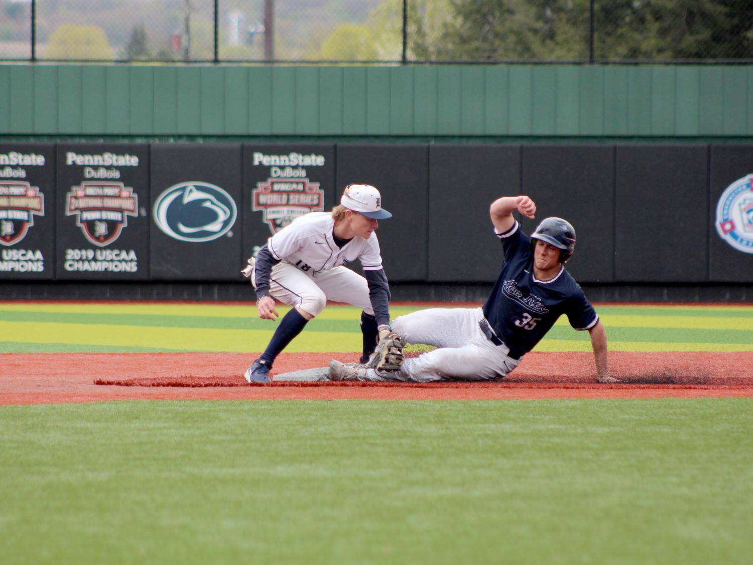 Penn State DuBois freshman Alex Gavlock applies a tag at second base to a New Kensington runner during a recent home game at Showers Field