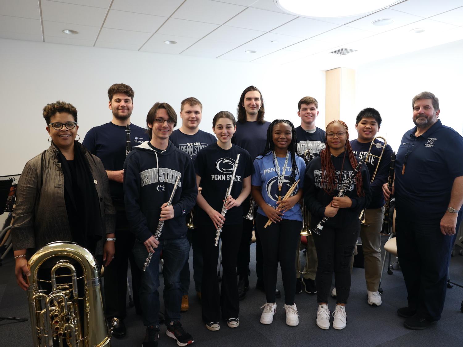 Group of people holding instruments