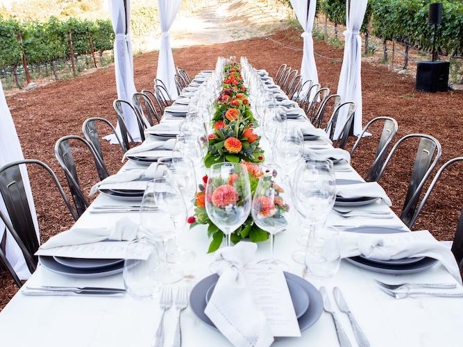 dining table set up outdoors at a winery