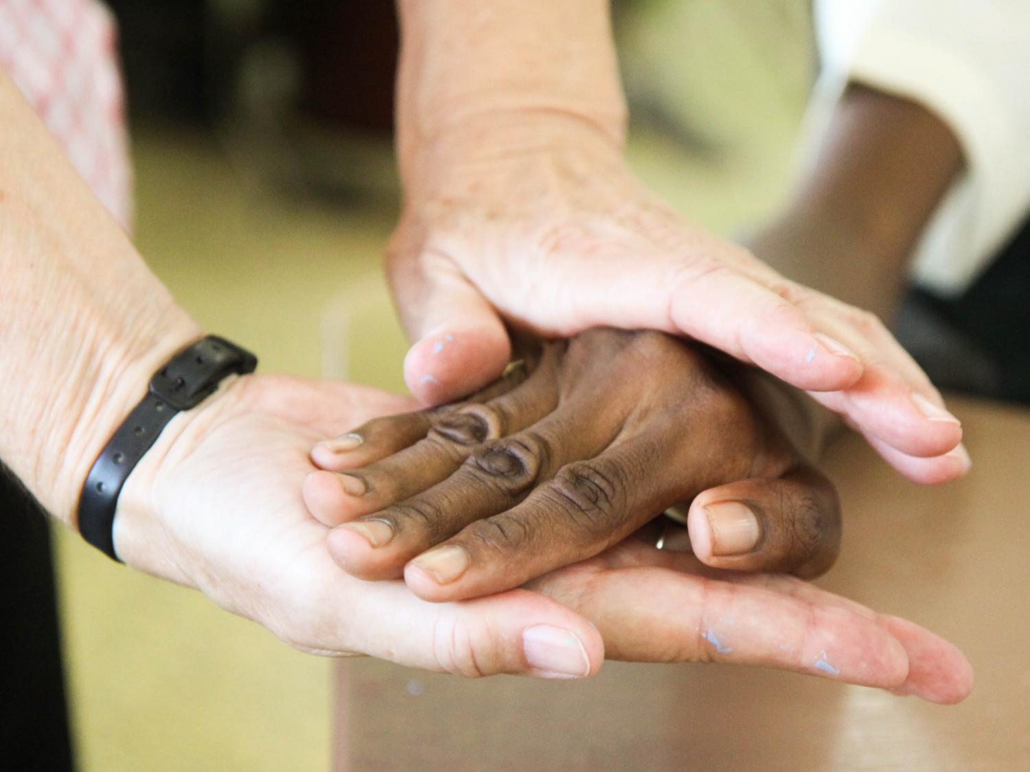 A picture of hands covering each other