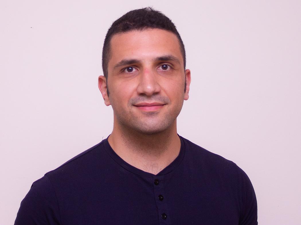 Headshot of Ali Ghazvnian 