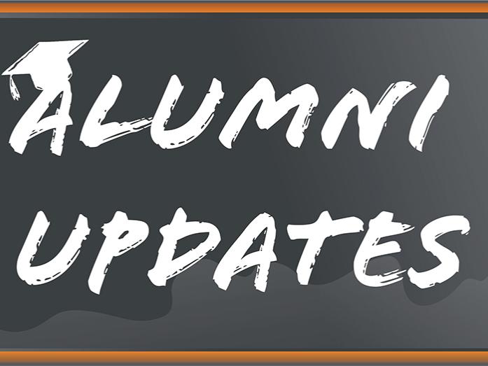 blackboard with alumni updates written on it in white chalk