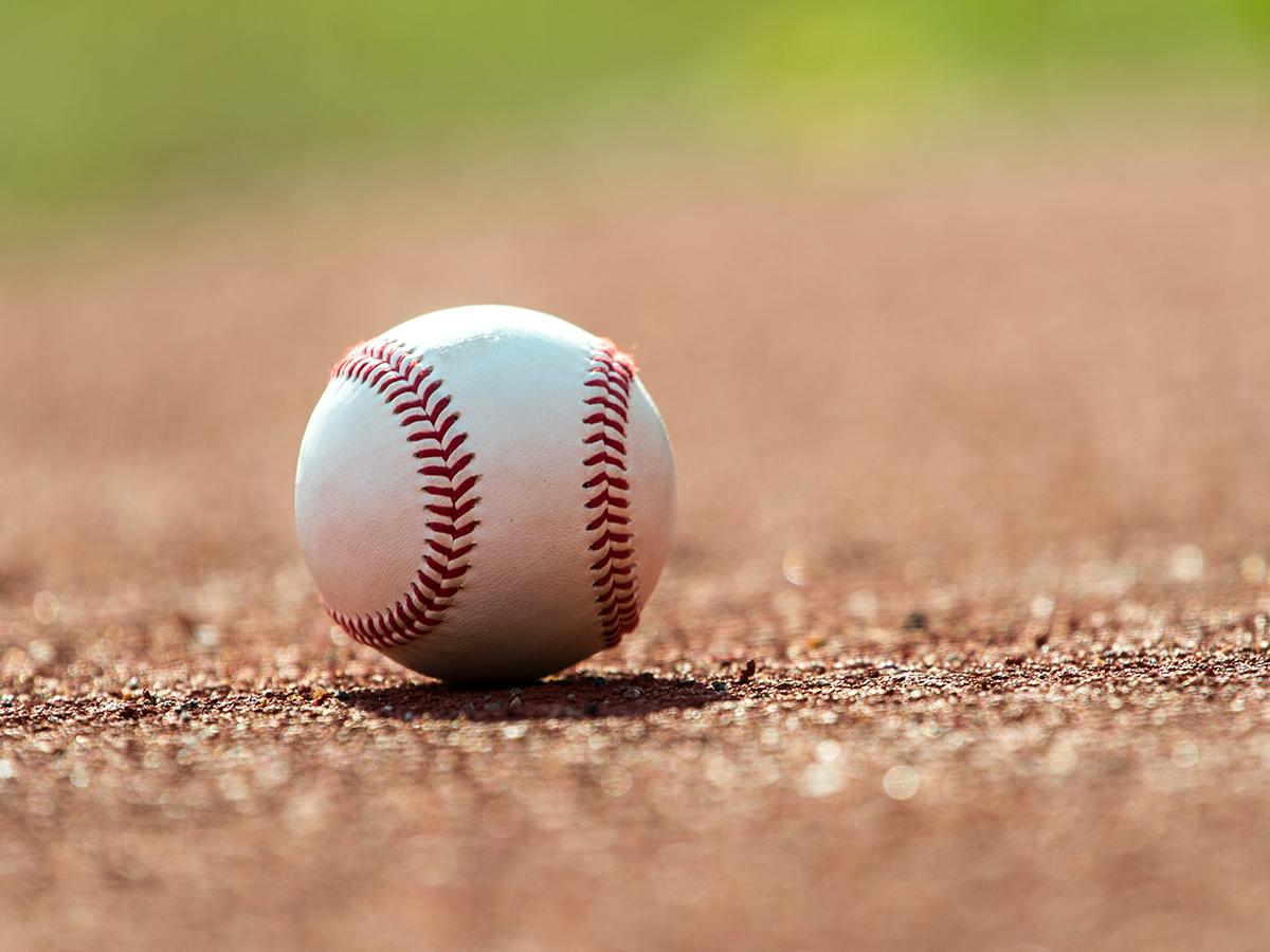 A baseball on the ground