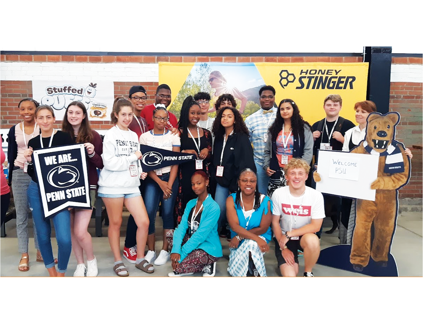 A group of students post for a photograph