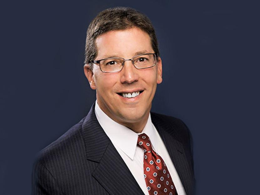Man smiling with glasses