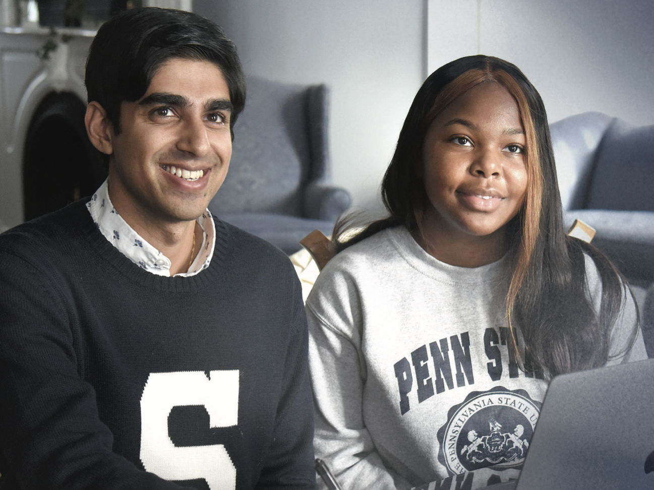A mentor and mentee sitting together