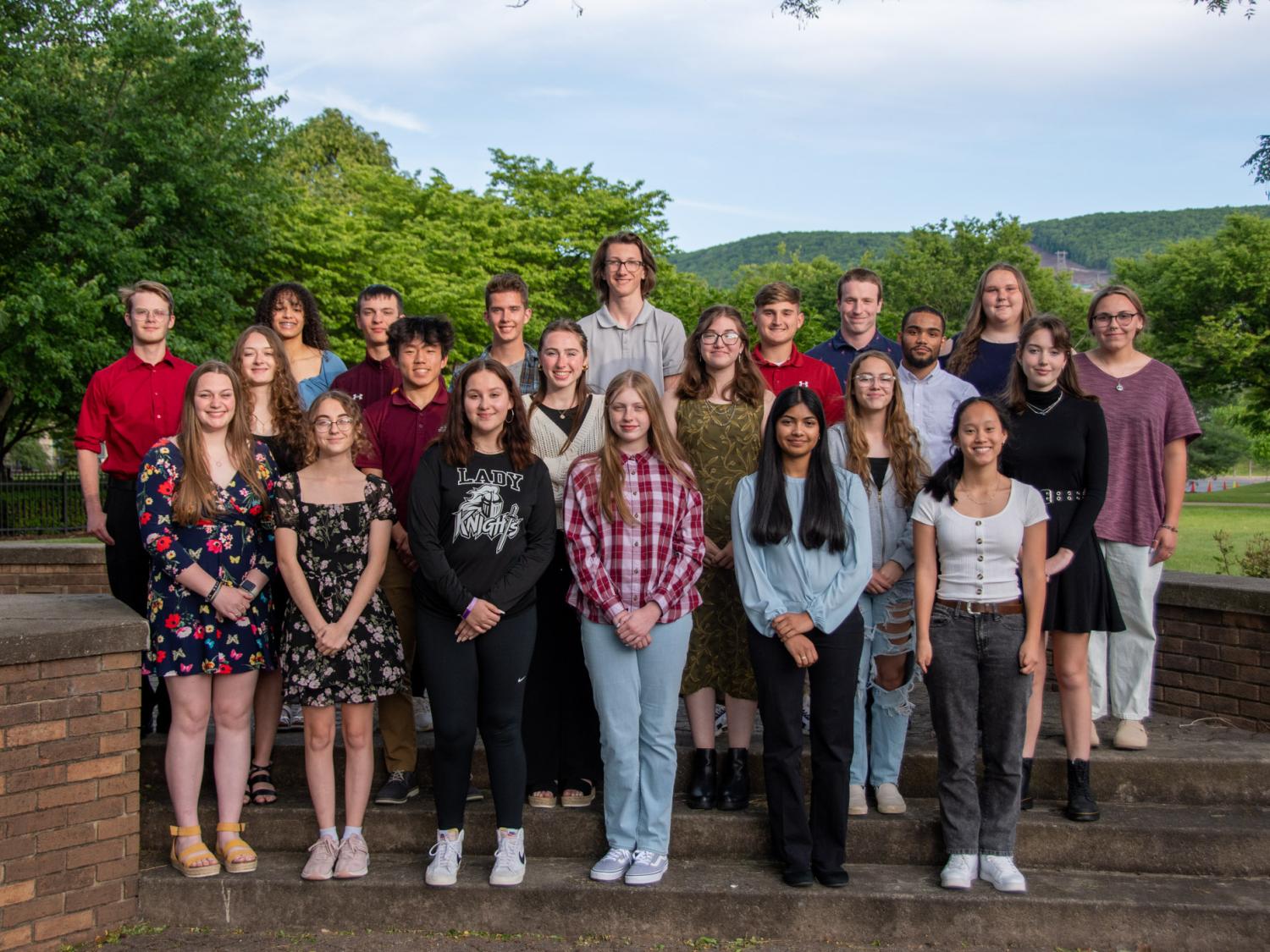A group of students pose together for a portrait