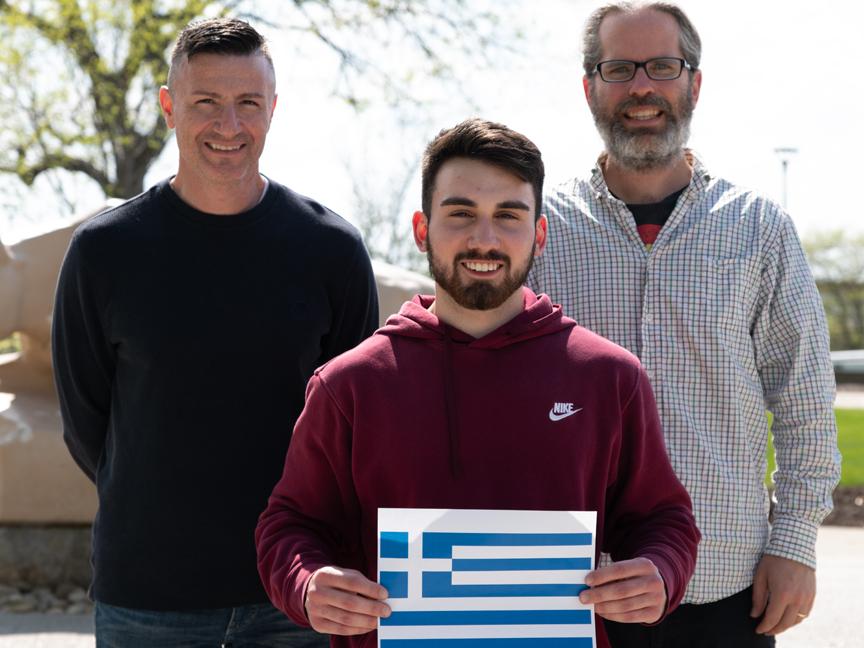 Zachary Allamon beside mentors Aris Karagiorgakis and Andy Royston