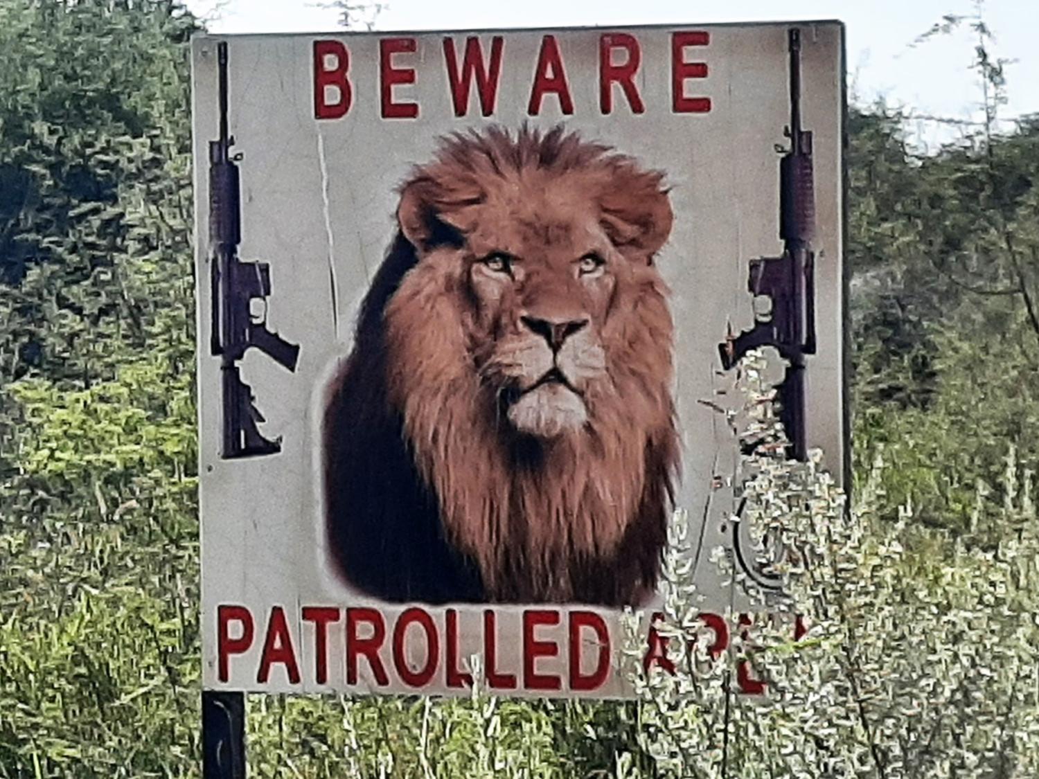 A warning sign to poachers in a wildlife protected area in Africa 