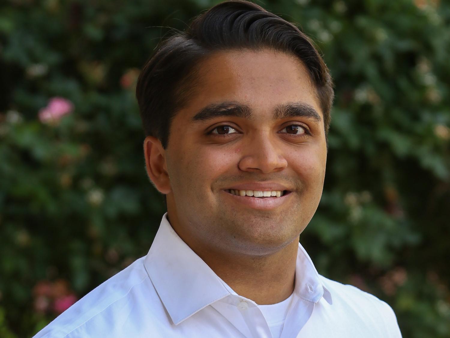 head shot of smiling Neil Patel