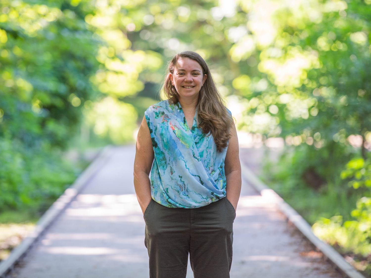 Sherri "Sam" Mason stands on a boardwalk on a Wintergreen Gorge trail.
