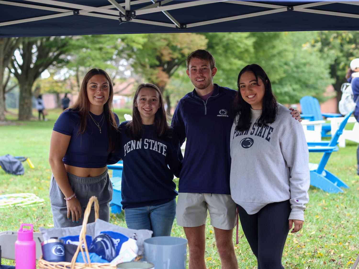 four students smiling