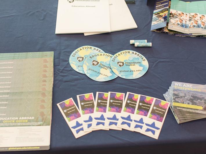 A table full of Education Abroad promotional materials
