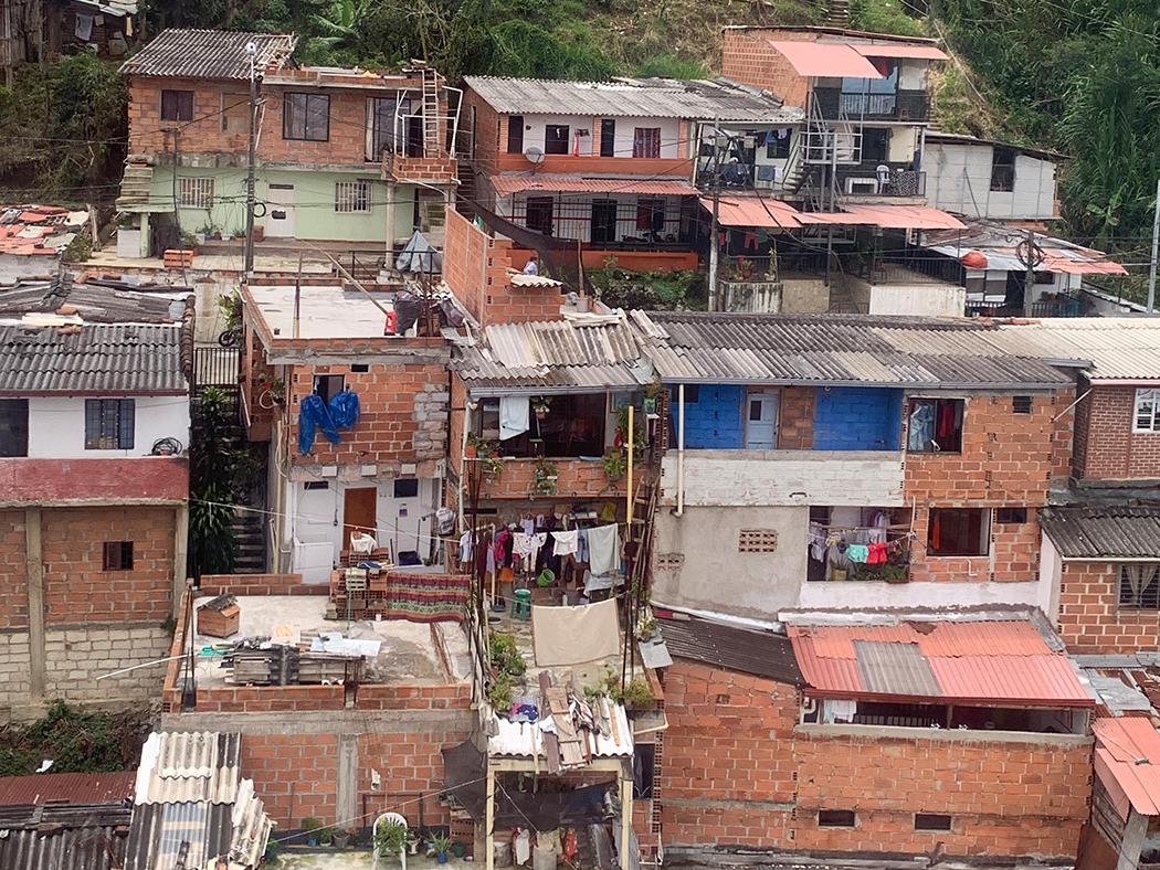 A cluster of houses nearly on top of one another in Medellín, Colombia.