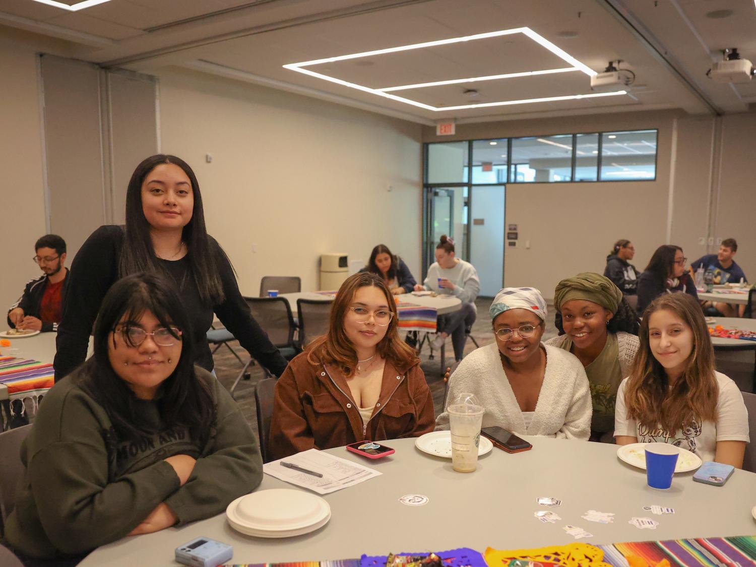 students gathered at a table
