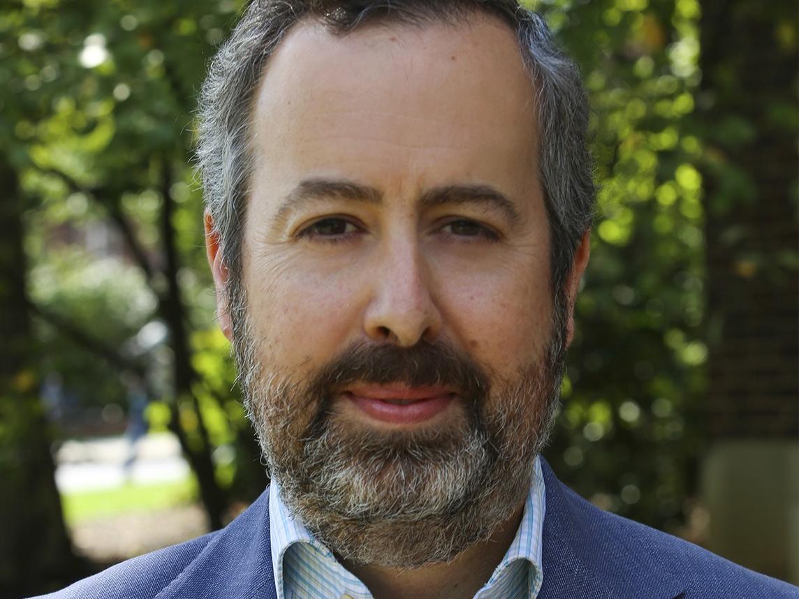 White man with grey hair and beard