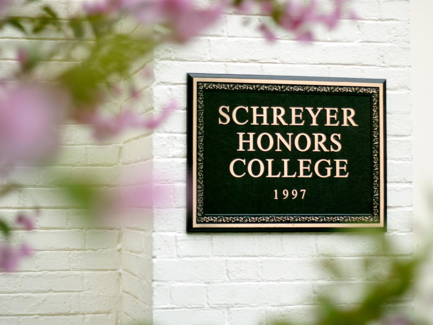 Schreyer Honors College plaque on the outside of Atherton Hall