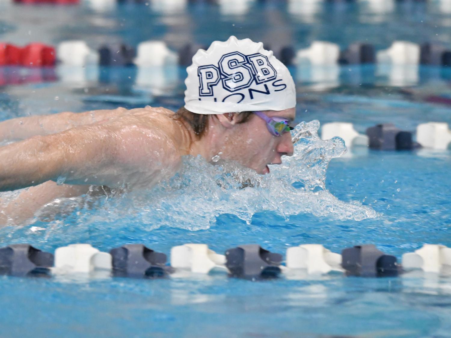 Penn State Behrend swimmer Tim Compton competes in a race.