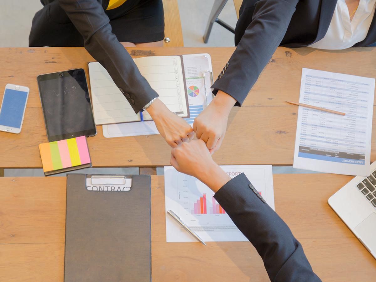 Business hands in the middle