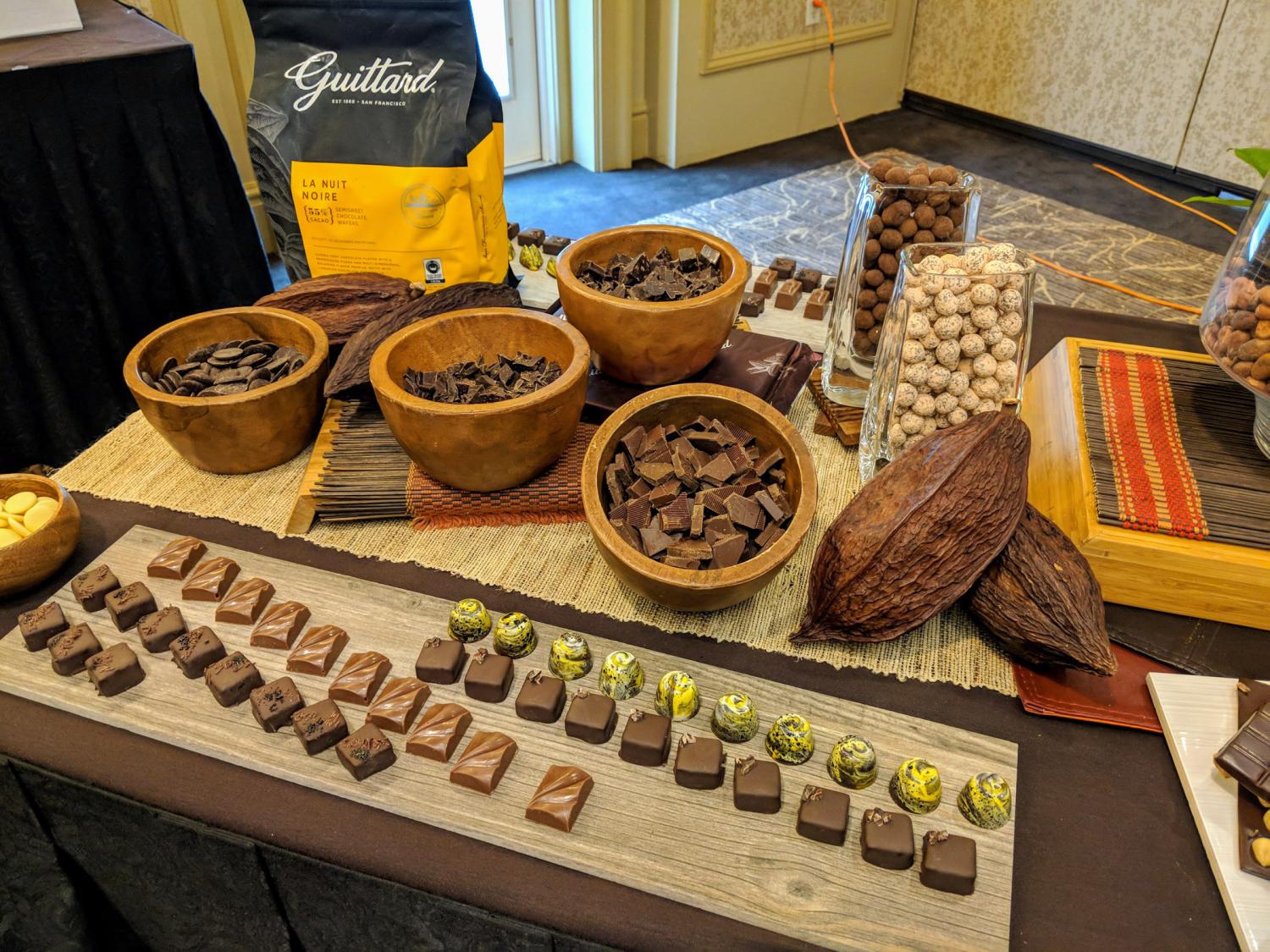 A display of chocolates on a table for a confectioners show