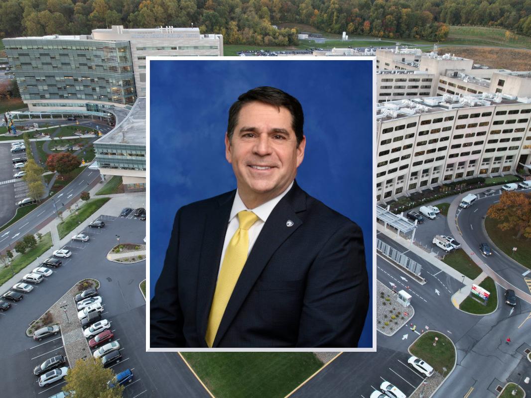 A professional headshot of Don McKenna is placed over an aerial photo of the Milton S. Hershey Medical Center.