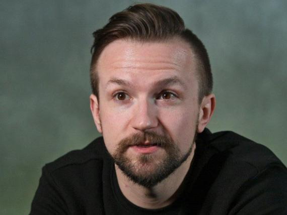 A portrait of Matthew White, CEO of Whitethorn Games