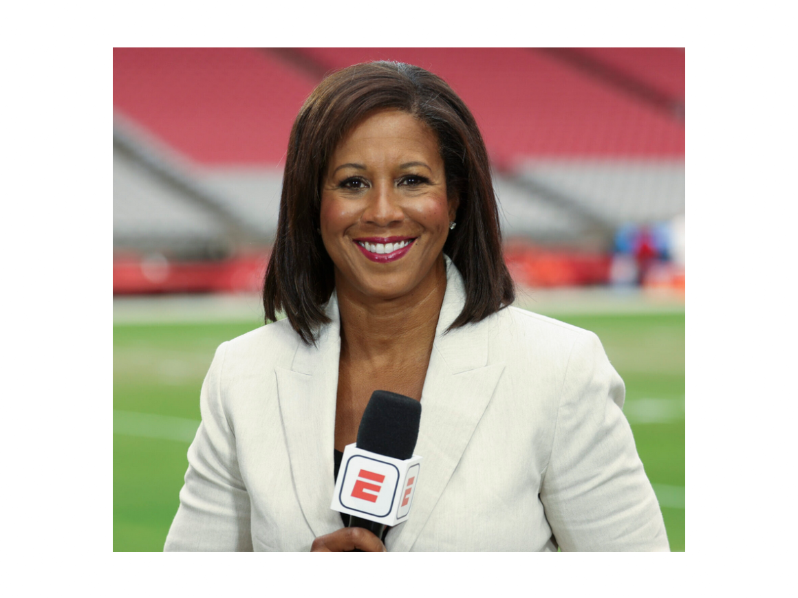 Lisa Salters holding a microphone