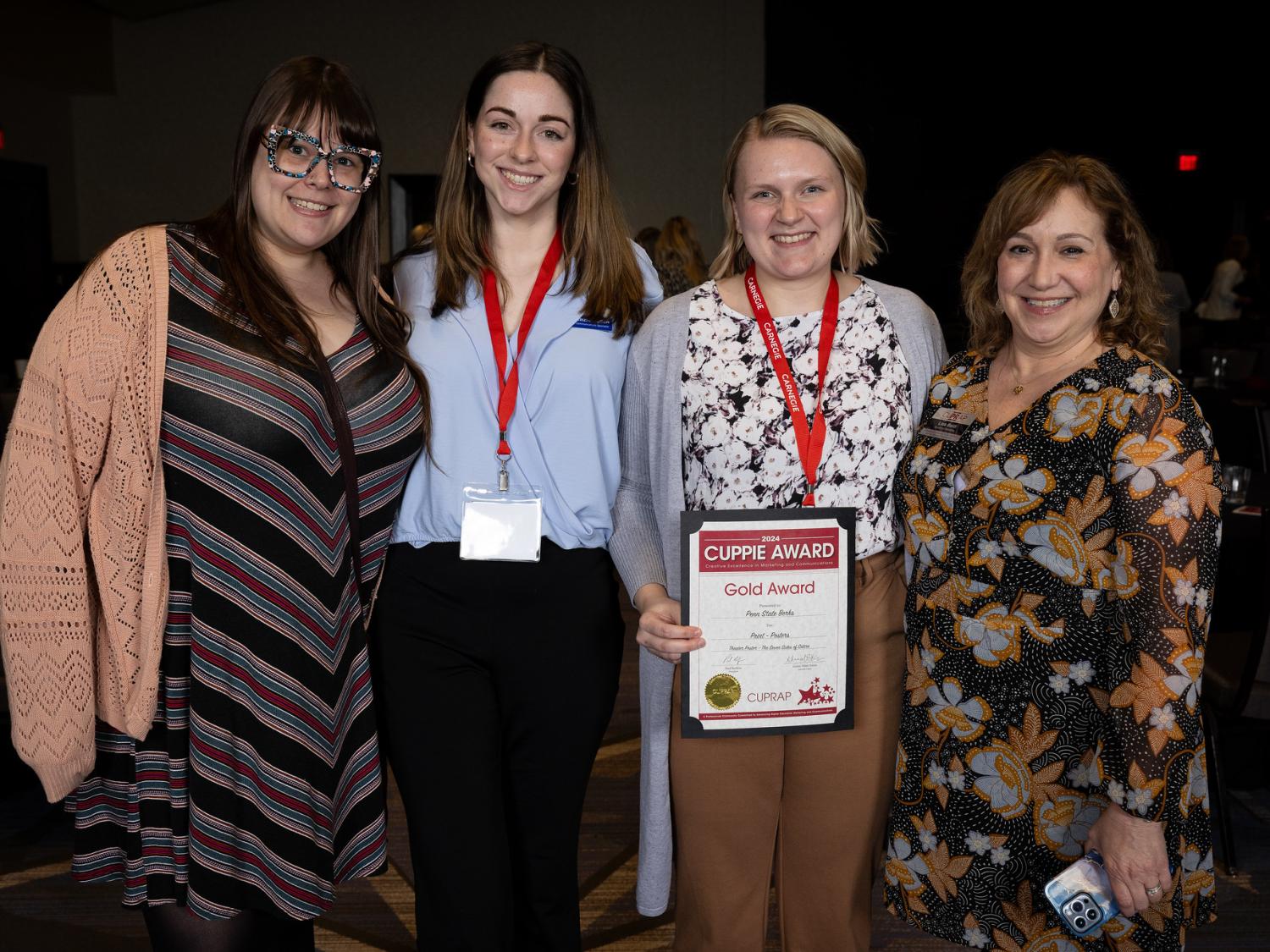 Berks Strat Comm team of four poses with certificate