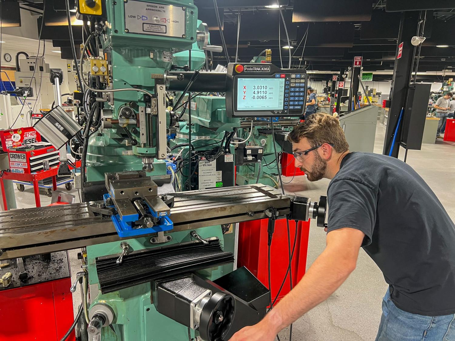 A student lines up the tooling to machine a mold in Penn College's Larry A. Ward Machining Technologies Center