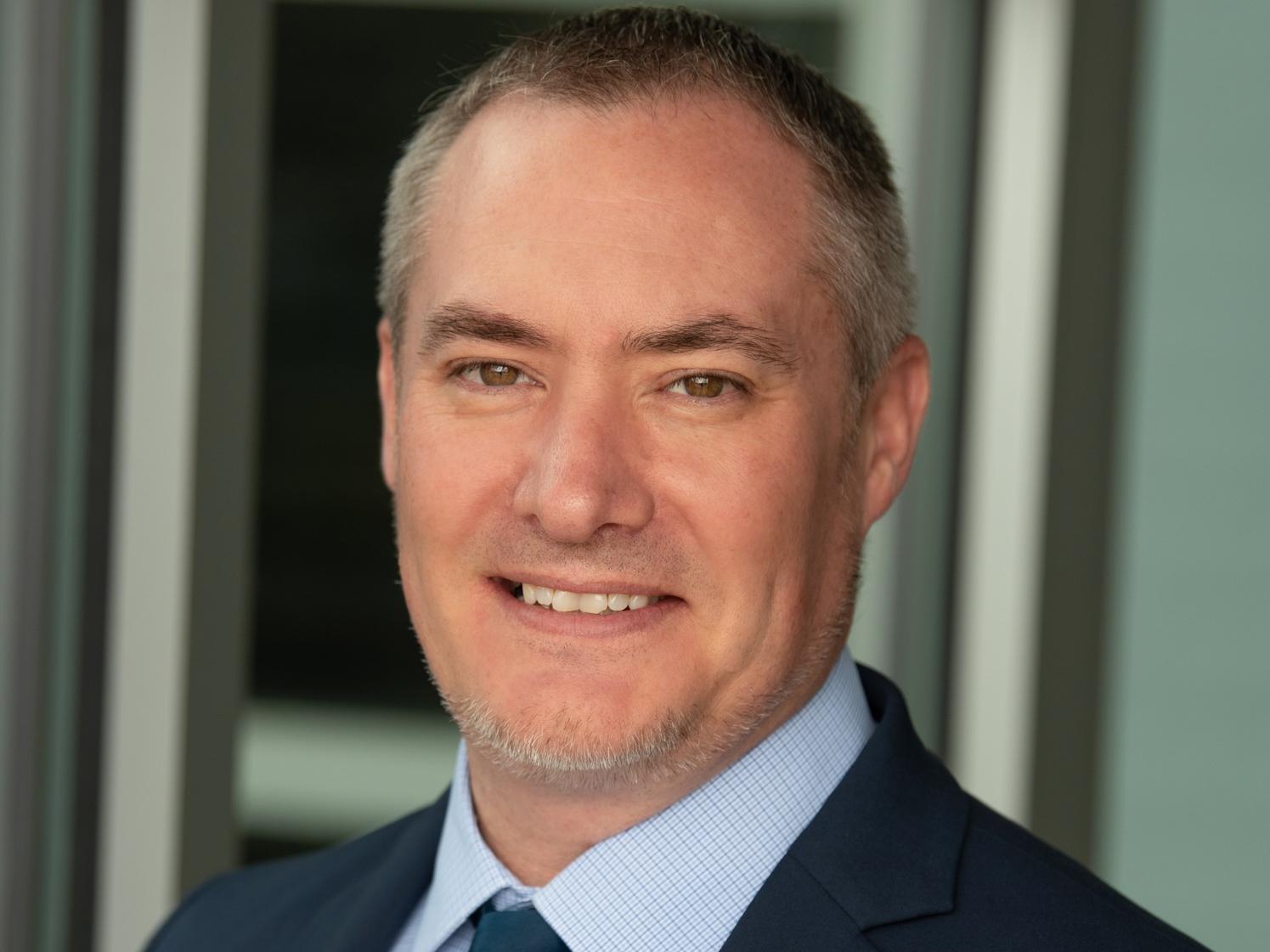 A headshot image of Benjamin Thomas