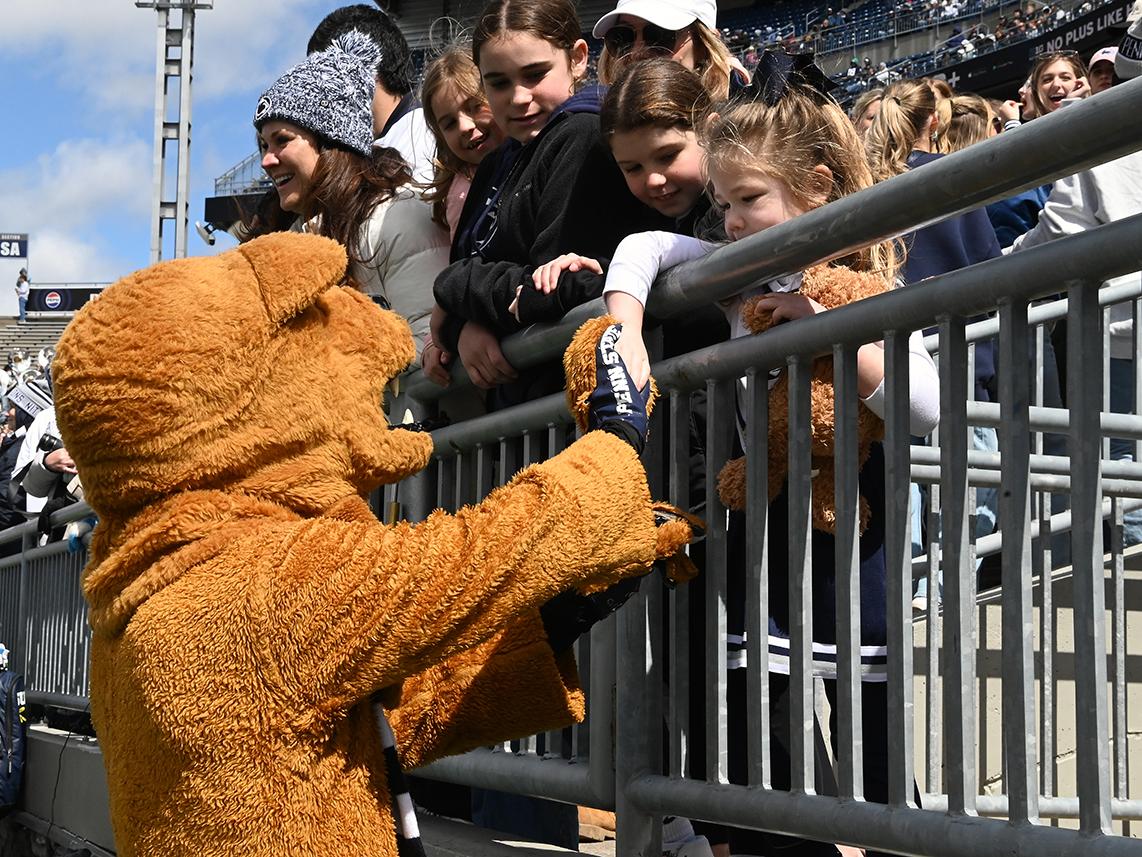 Nittany Lion meet young fan