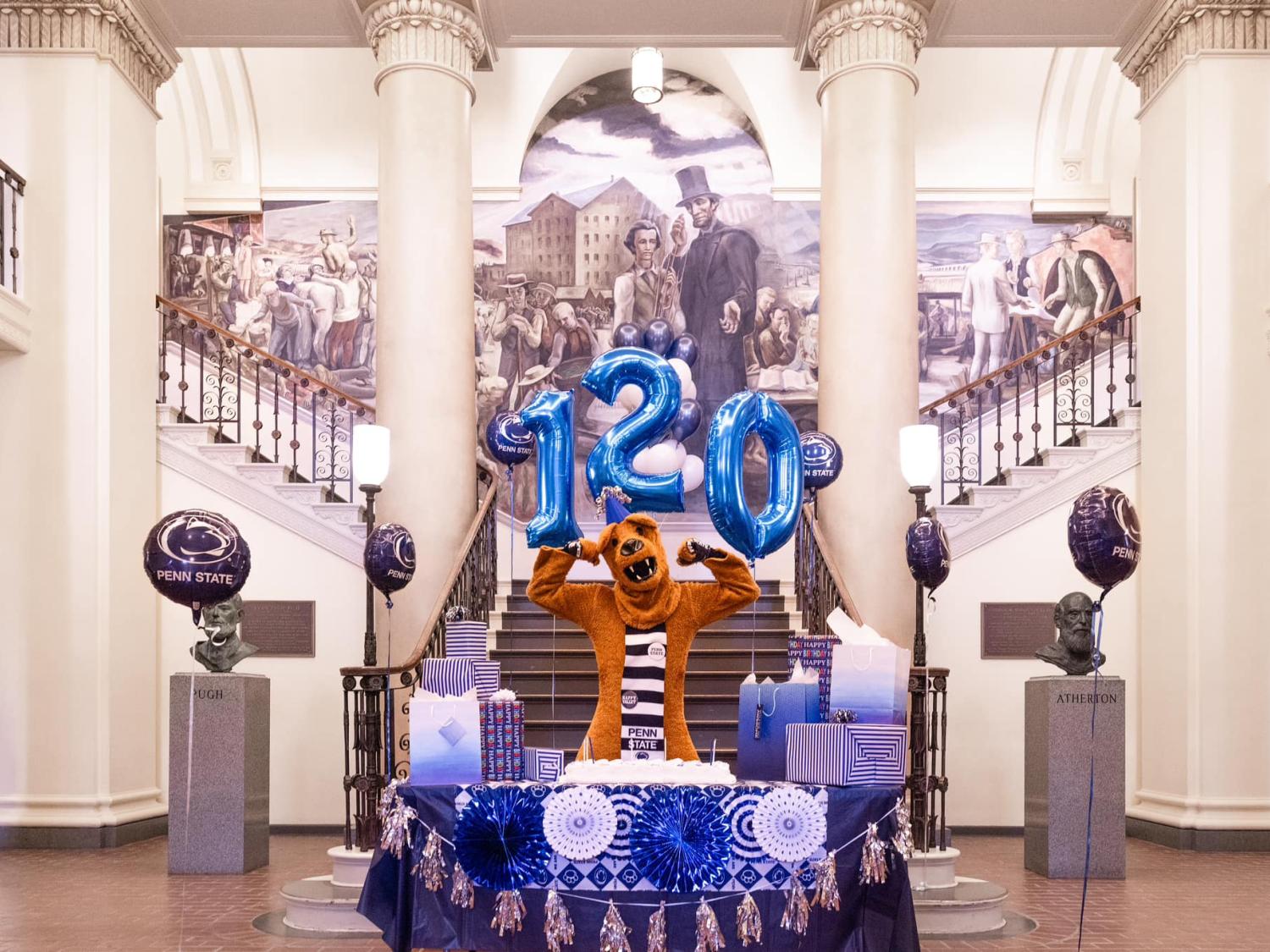 The Nittany Lion surrounded by balloons at his birthday celebration