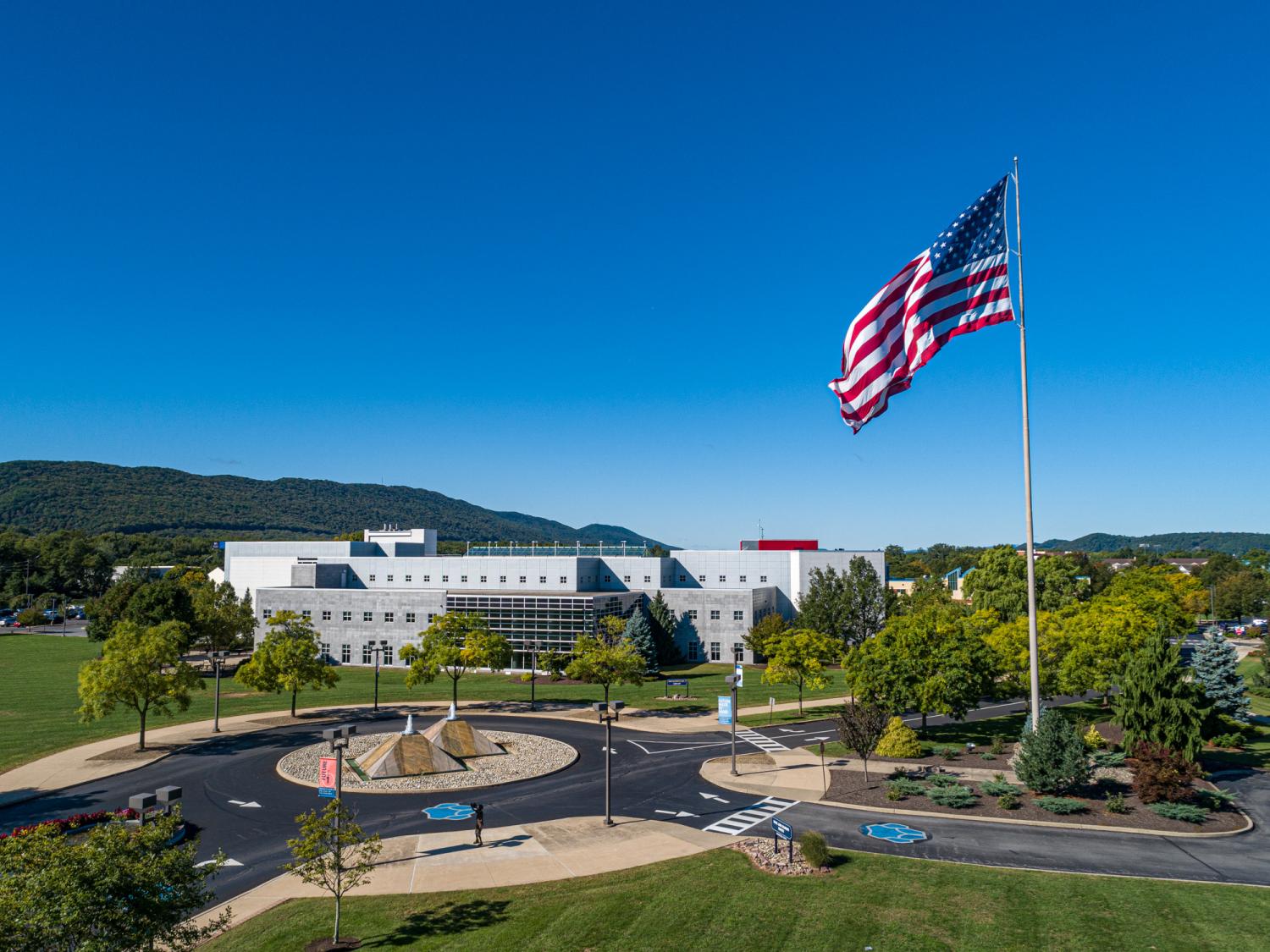 Penn College campus with United States flag