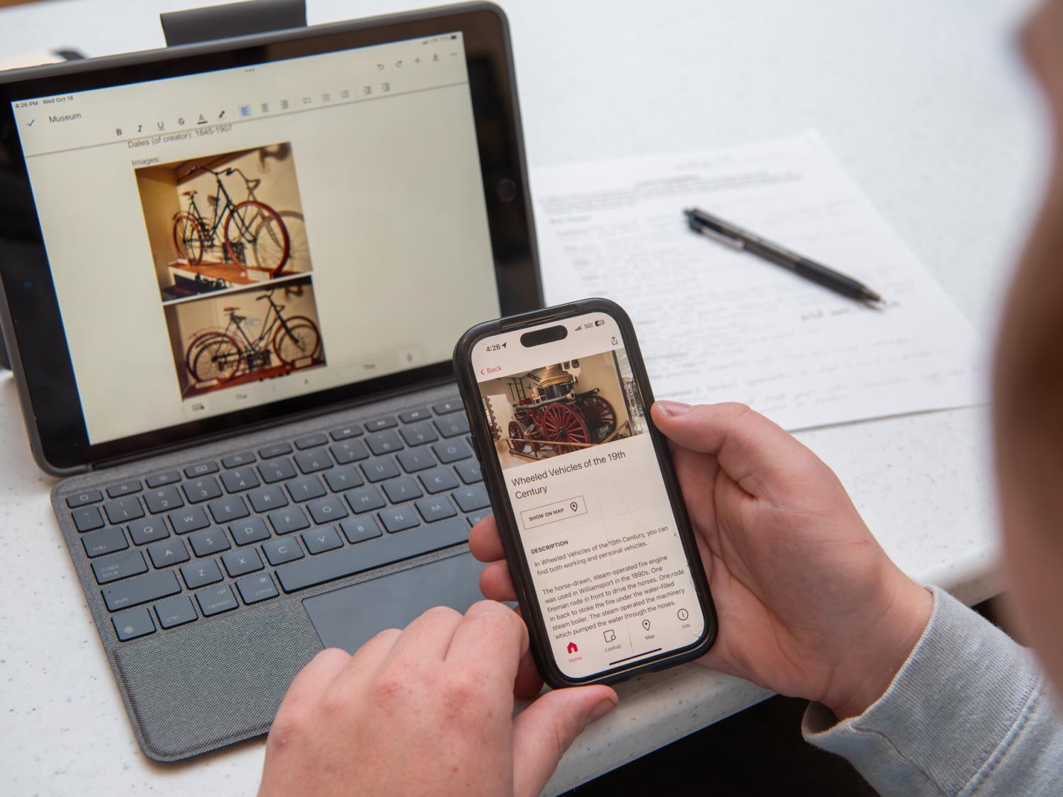A person uses an app to navigate a website