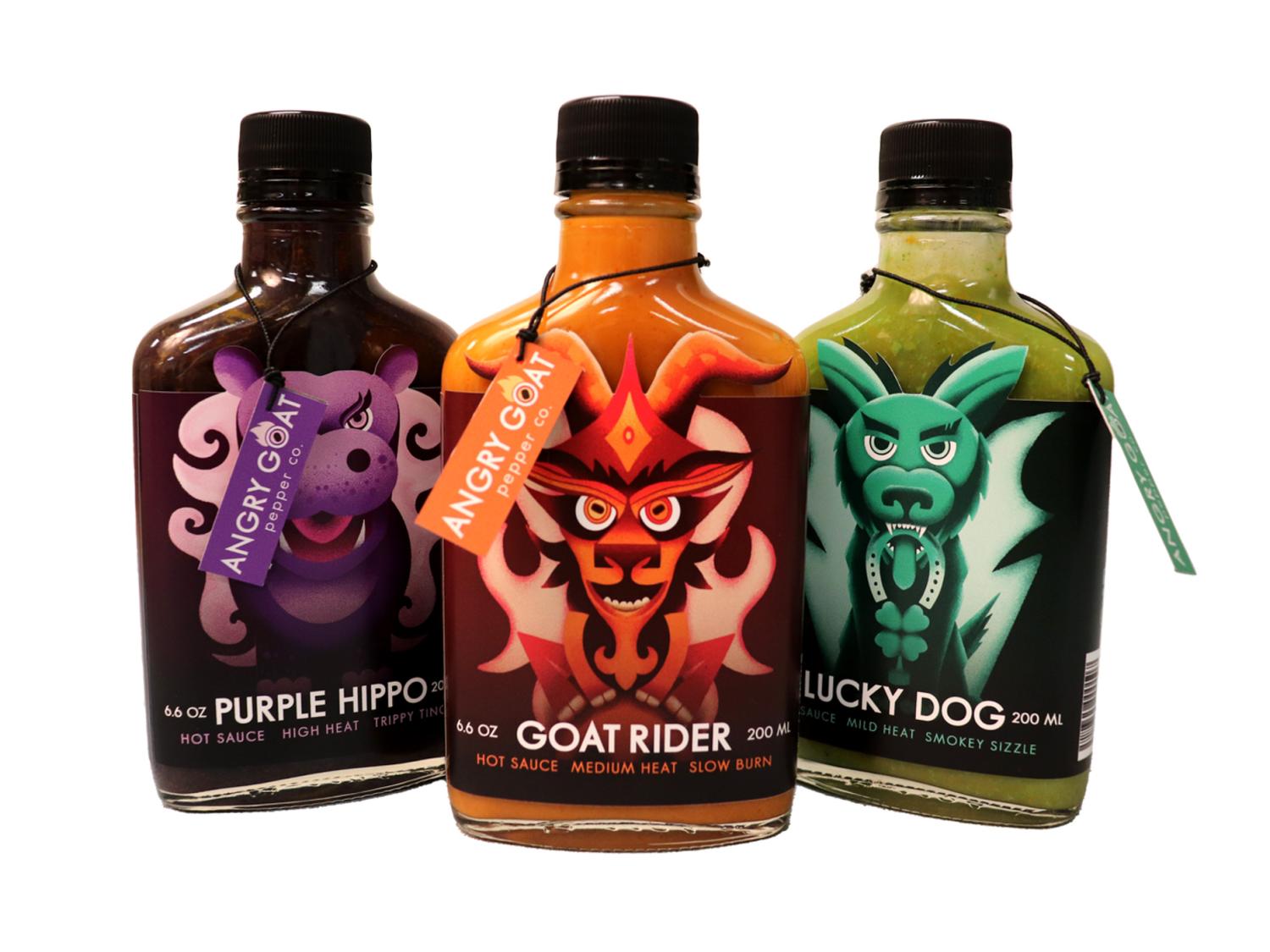 Taylor J. Leshock’s “Hot Sauce Packaging” design on three colorful bottles