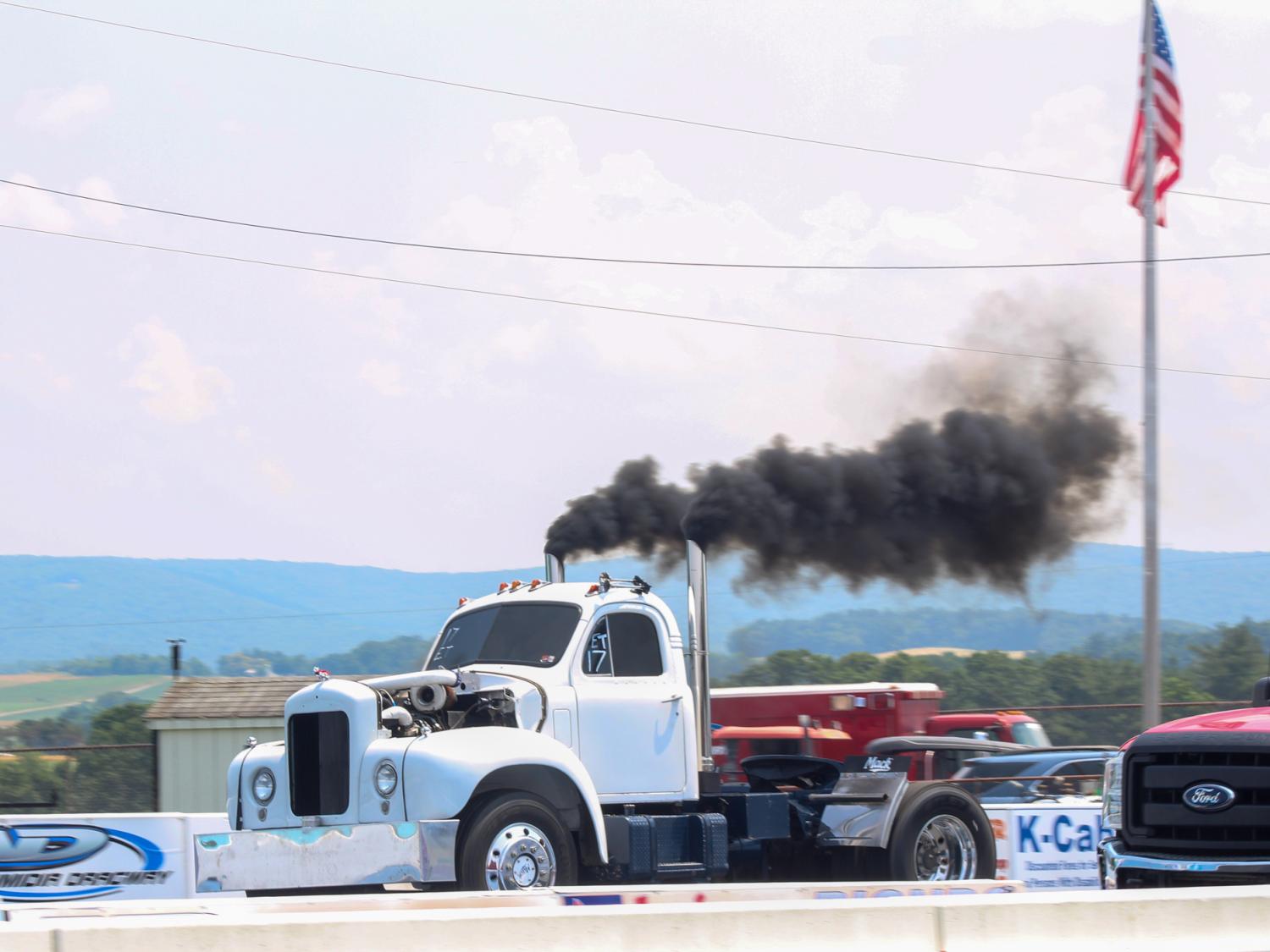 A drag truck sits on the road