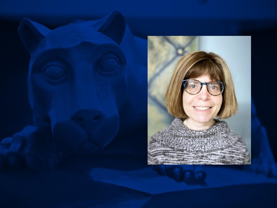 A headshot of a person wearing glasses is overlaid on a blue graphic with a statue of a lion mascot
