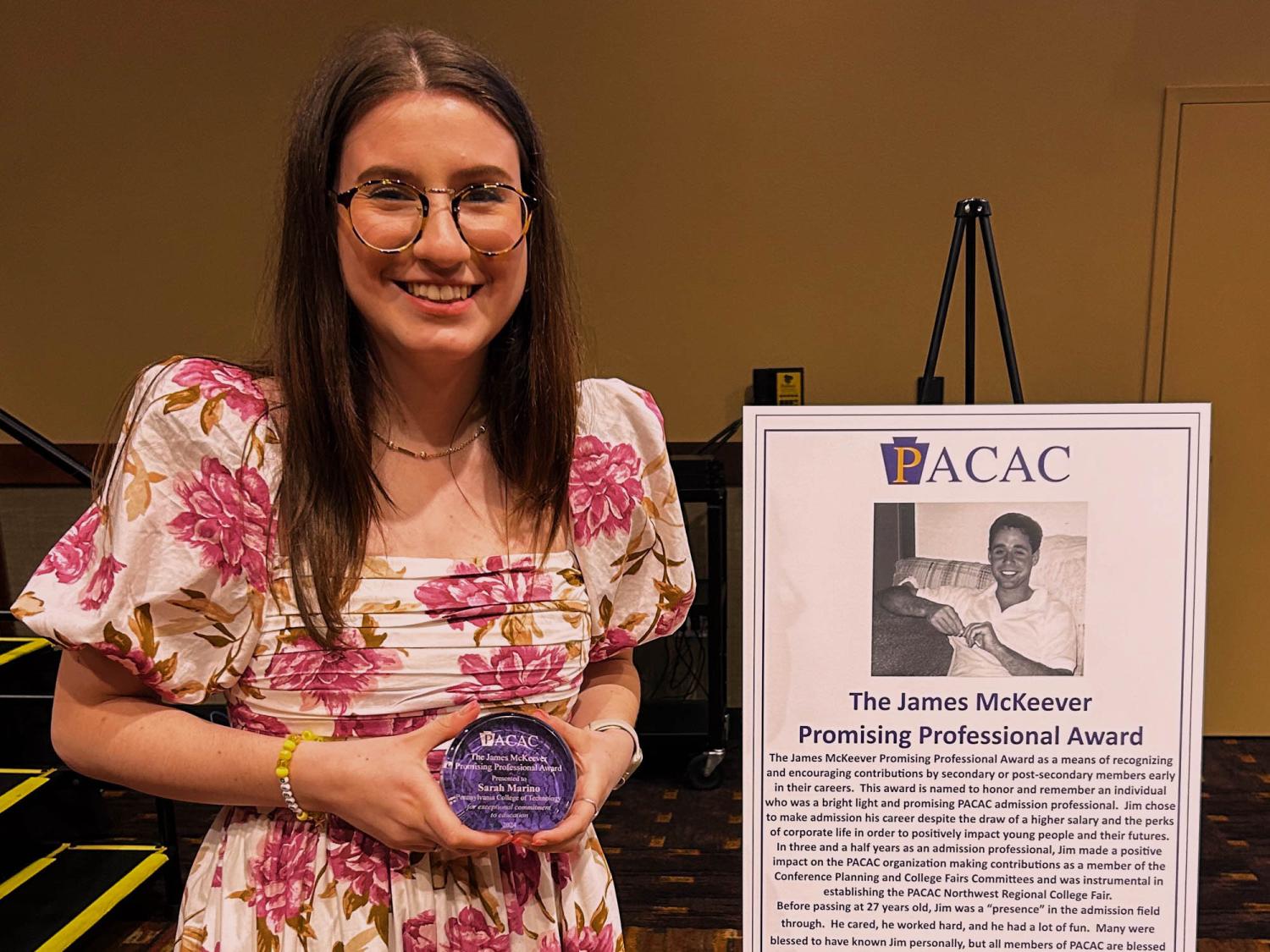 Sarah Marino with an award