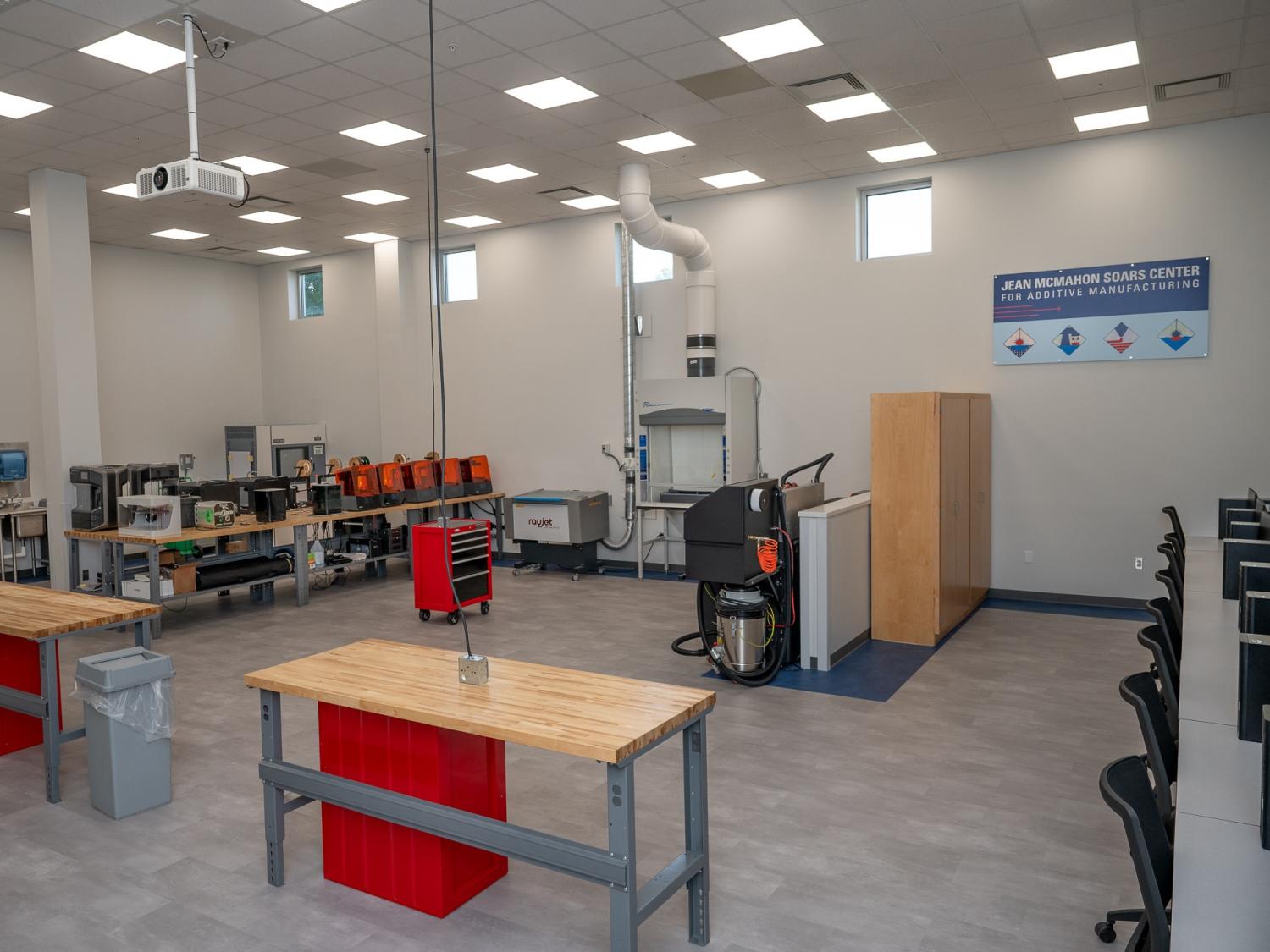 Tables and equipment inside the new Jean McMahon Soars Center for Additive Manufacturing at Penn College