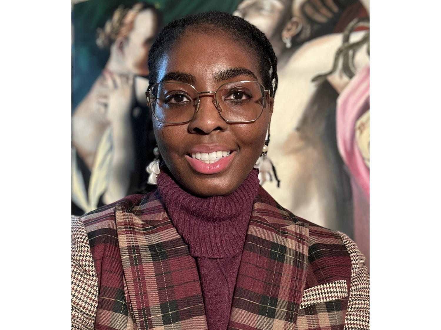 Head shot of a person wearing glasses