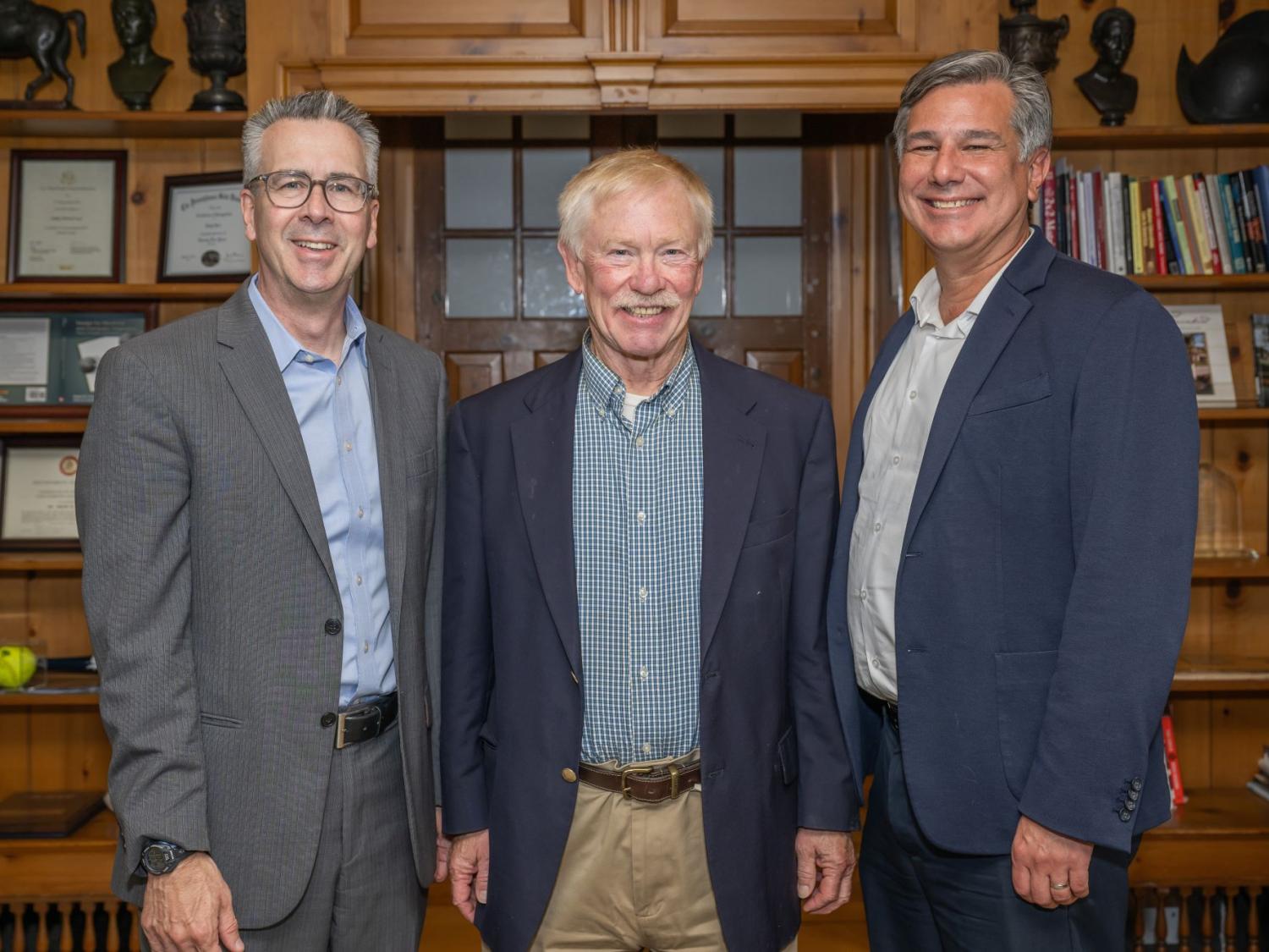 A portrait of Penn State Behrend Chancellor Ralph Ford, college friend Dave Meehl and Tim Kurzweg, the James R. Meehl Director of the School of Engineering.