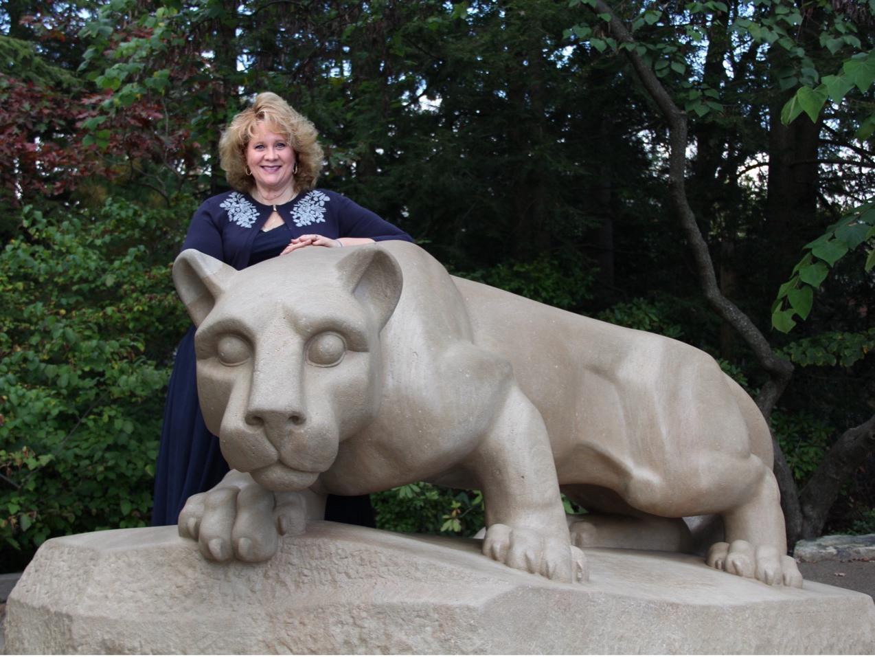 Susan J. Loeb with the Penn State Lion Shrine