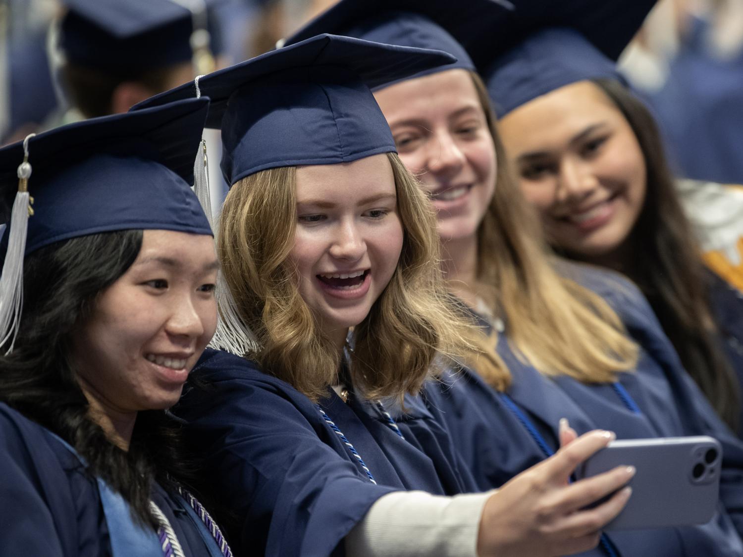 graduates take selfie