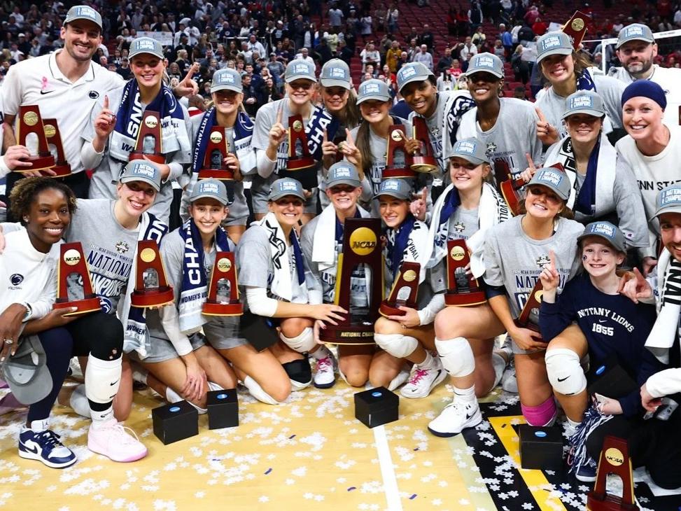Team poses with trophy