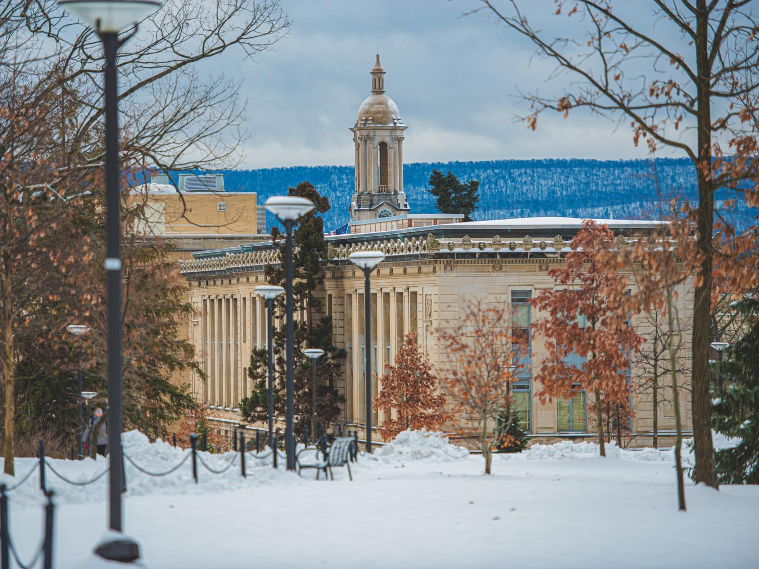 Old Main in winter with snow on the ground