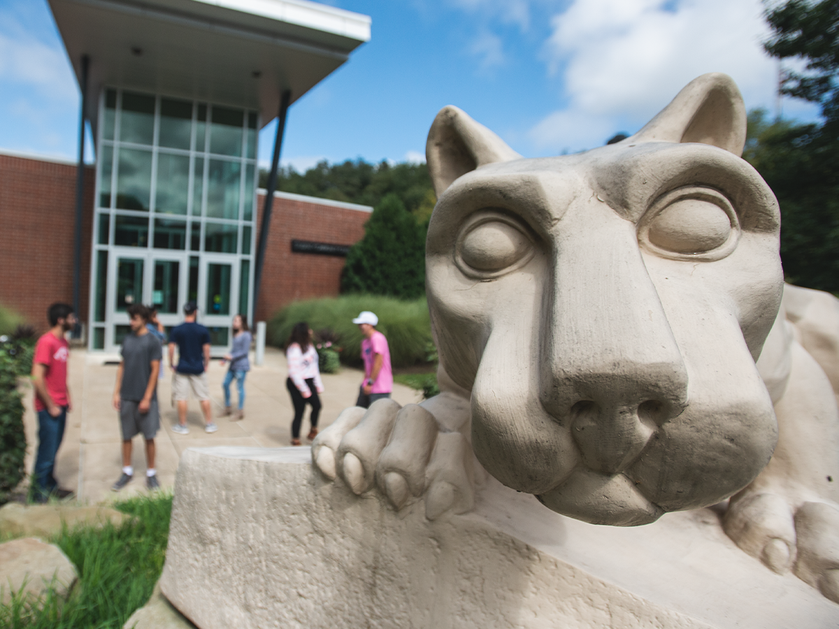 A close up photo of the Lion Shrine outside Penn State Greater Allegheny's Frable Building on a nice day.