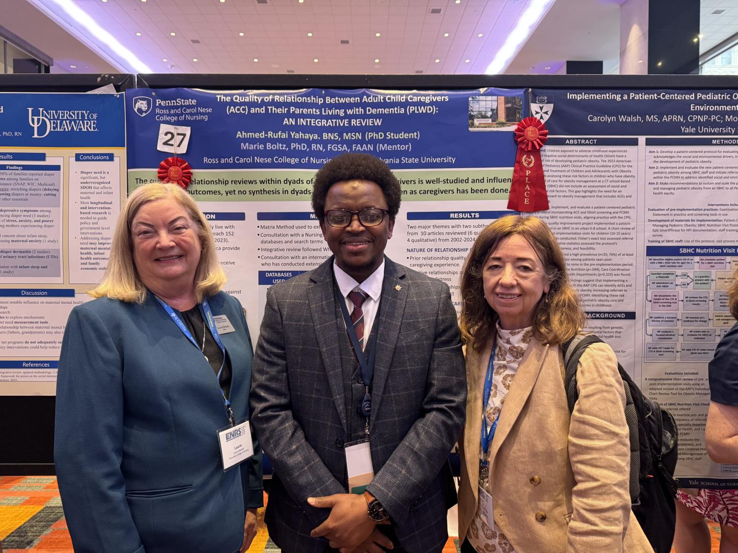 Ahmed-Rufai Yahaya (middle) pictured next to Laurie Badzek (left) and Marie Boltz (right).